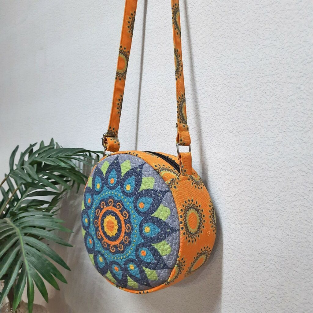 Premium Sling Bag for Women, Avioni Fashion Shoulder Bag, Bohemian Style-Peacock Rangoli, Braided Sides Round Sling Bag, Perfect For Gifts and Traveling-25 cms Diameter